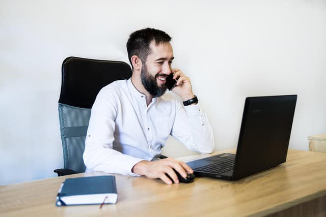 businessman from Ashford on a phone call