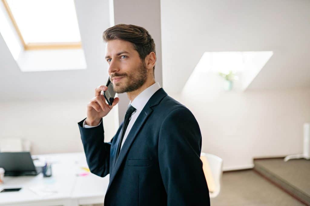 Businessman using his VoIP landline phone number